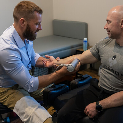 shockwave therapy Cedar Rapids, shockwave therapy near me, ESWT treatment near me, non-invasive injury healing, increase blood flow to injured tissues, tissue regeneration therapy, chronic pain relief Cedar Rapids, accelerated injury recovery