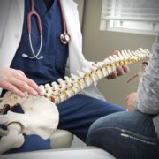 Doctor Going over Spinal Health
